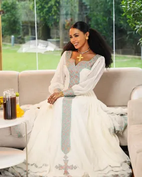 Enchanting Light Blue Habesha Dress: with Red Diamond Detailing Traditional Ethiopian Dress